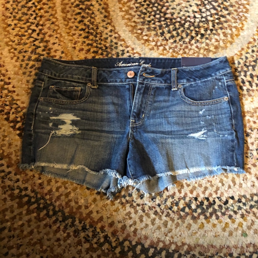 Raw hem denim shorts distressed look